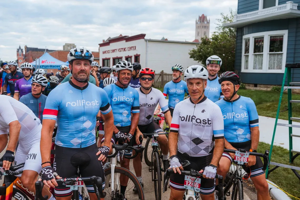 Club members in light blue Rollfast kit at the start line